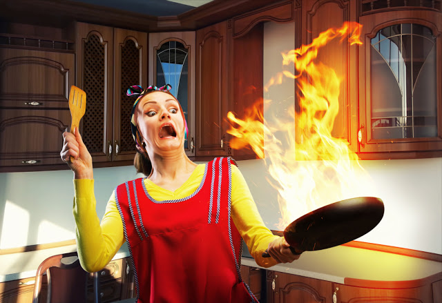 You can tell this picture was staged -- nobody has countertops that clean (or, you know, cupboards that empty)...