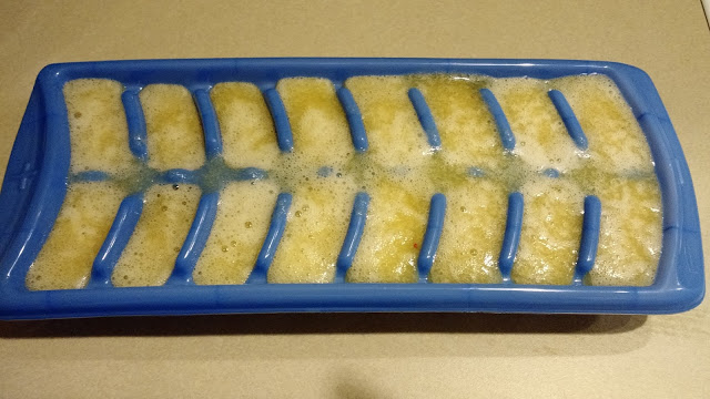 I'm not used to filling up ice cube trays, so naturally I overfilled the first one and gave the countertop a drink. This was attempt #2.